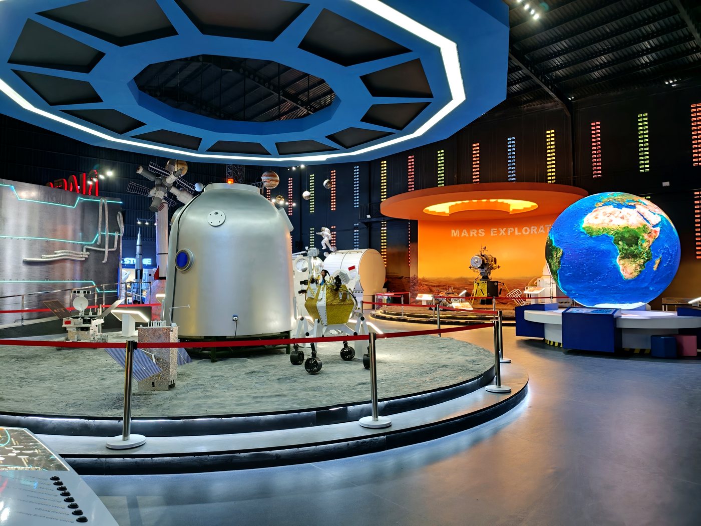 Mechanics gallery with a globe and engine display